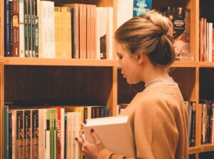 woman holding book